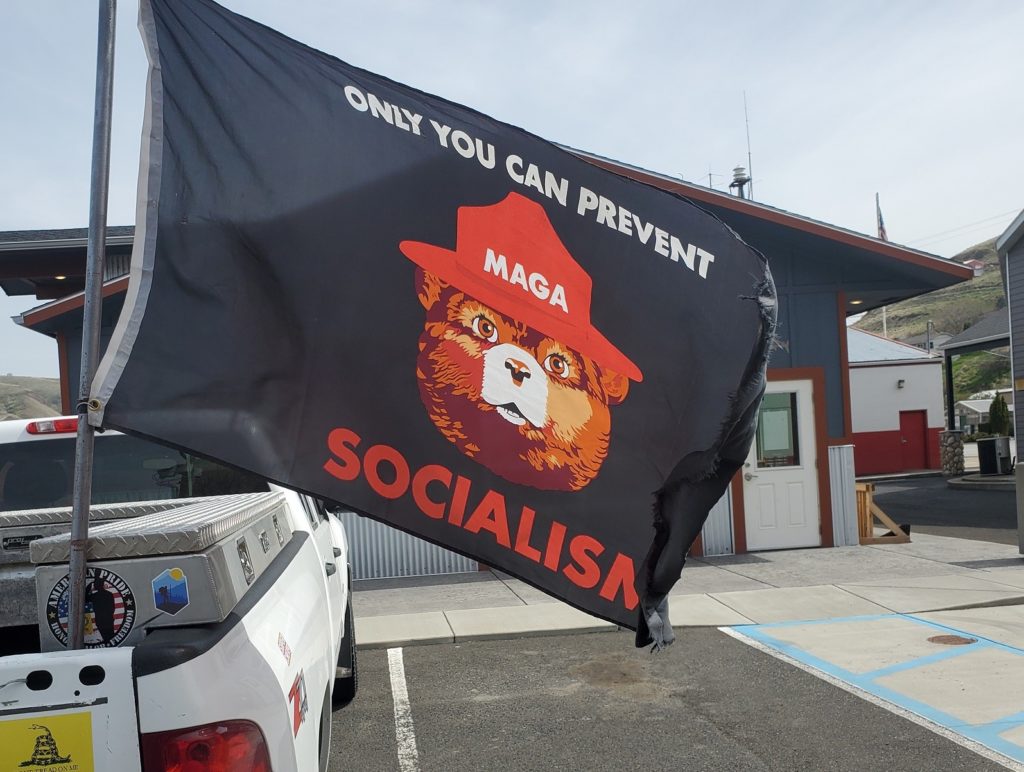 Maga meets Smokey Bear